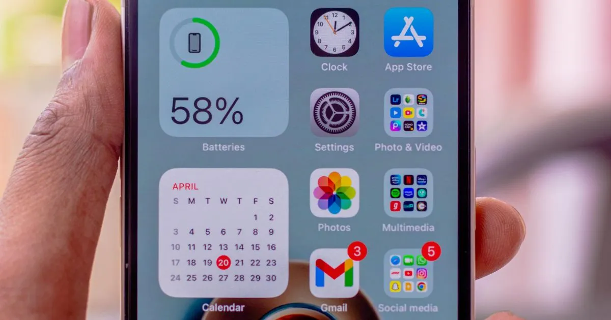 iPhone home screen displaying 58% battery, April calendar, and various app icons for best free widgets on iPhone and Android.